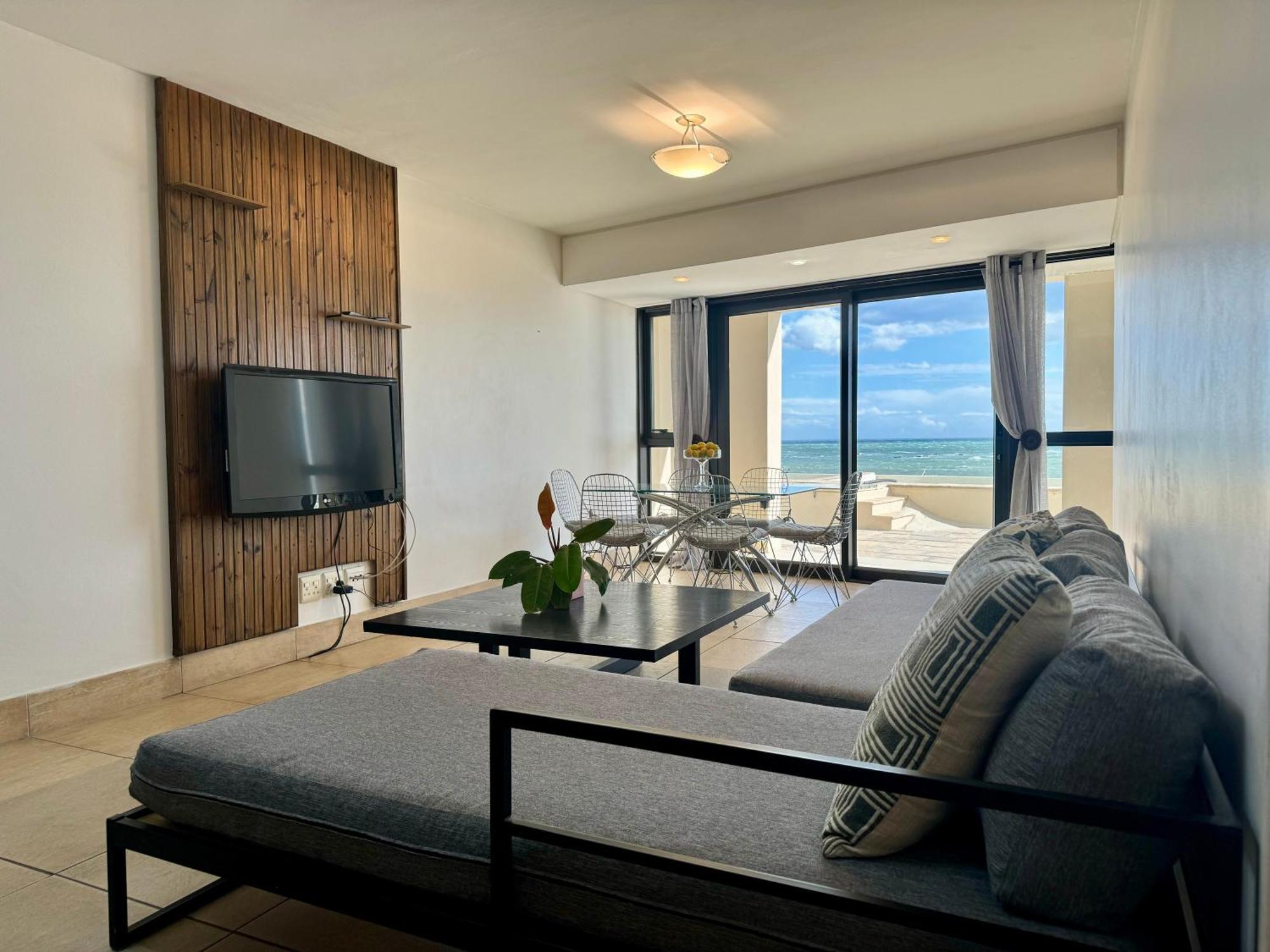 Loddey'S Self Catering Apartments - By Beach Collection Strand Bagian luar foto